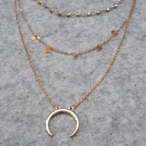 Half moon goldtone neckace